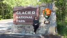 Angela at the entrance to Glacier National Park